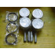 Original Nissan Datsun Cherry Sunny Kolben 4 Stück mit Kolbenringen 12010-H1064 12010-H1065 12035-H6201 12035-H6200